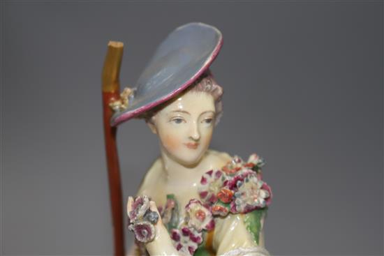 Two Chelsea gold anchor figures of a shepherdess and a huntsman, c.1765, 27.5 and 22.5cm